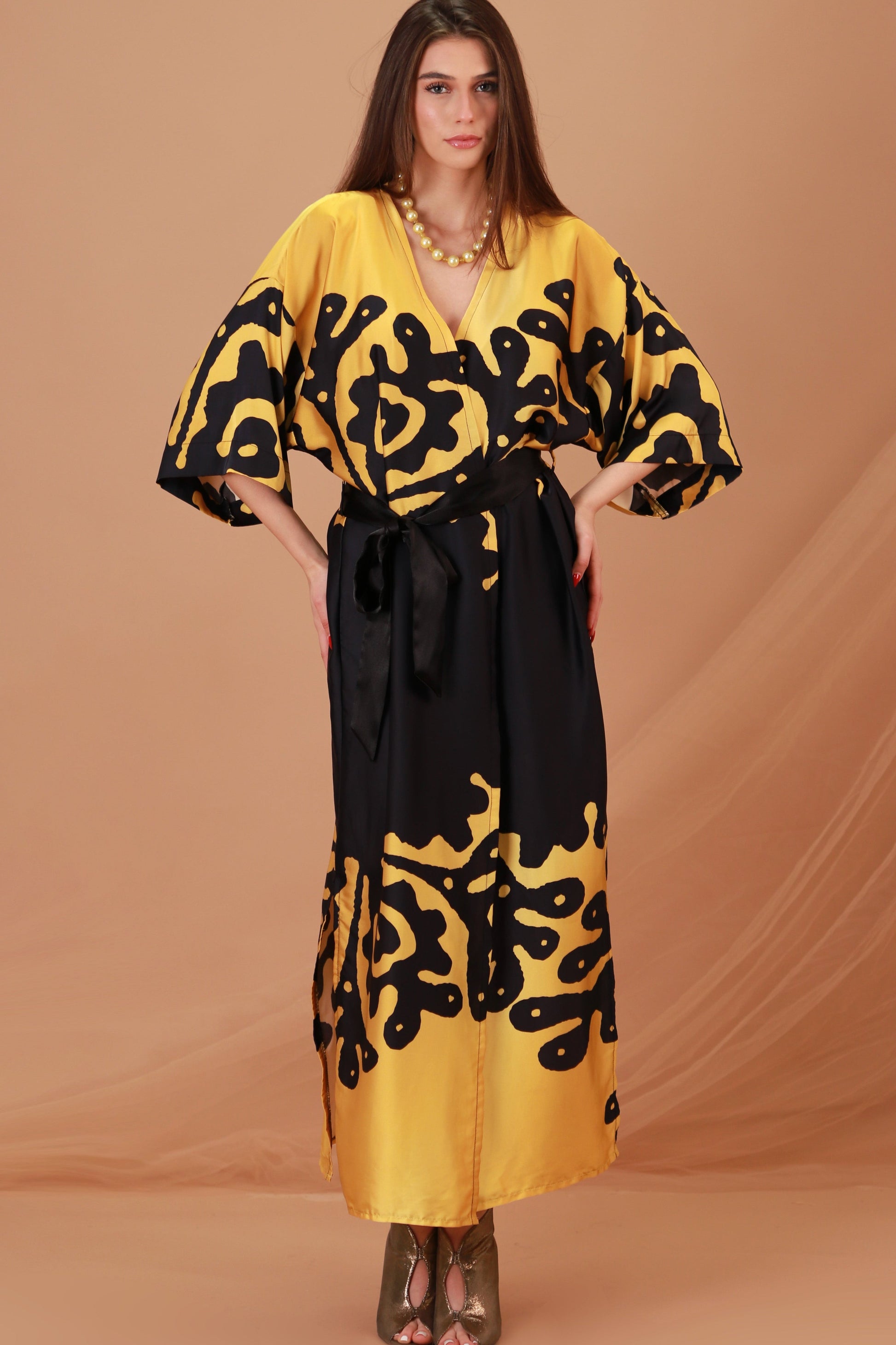 Model in the kimono Black Golddess by Paraima handmade limited collection in unique one of a kind pattern per piece front closed view